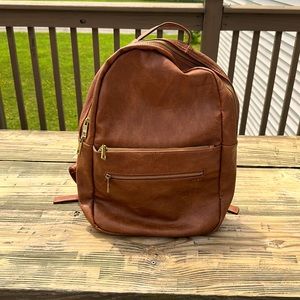Tan Fawn Design backpack. Genuine vegan leather.